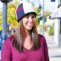 woman smiling wearing berber fleece lined upcycled beanie hat